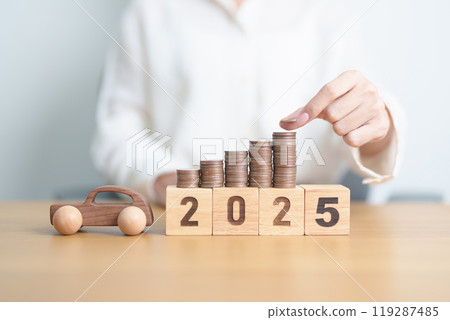 Happy New Year 2025 with car model and Coins Money stack for deposit and Automobile Tax. Money Saving, Car Insurance, Financial, vehicle Repair and Maintenance and New Year concept 119287485