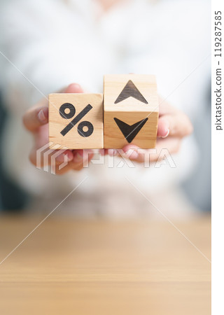 wood block of percentage change to UP and Down arrow. Interest rate, GDP, stocks market, financial, deflation and Inflation, ranking, mortgage, debt, Loan and Economic Recession concept wood block of percentage change to UP and Down arrow. Interest rate, GDP, stocks market, financial, deflation and Inflation, ranking, mortgage, debt, Loan and Economic Recession concept 119287585