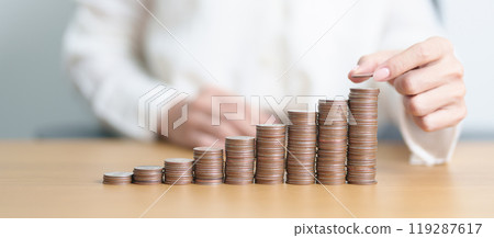 Money Saving for Future Plan, Retirement fund, Pension, Investment, Wealth Business and Financial concepts. coin stack on table, Money counting and stack arrangement for deposit Money Saving for Future Plan, Retirement fund, Pension, Investment, Wealth Business and Financial concepts. coin stack on table, Money counting and stack arrangement for deposit 119287617