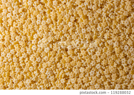 Uncooked Stelline Pasta Background Uncooked Stelline Pasta Background 119288032