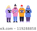 A group of diverse individuals warmly dressed in winter attire sings joyfully, embodying the holiday spirit during a festive winter choir gathering. 119288858