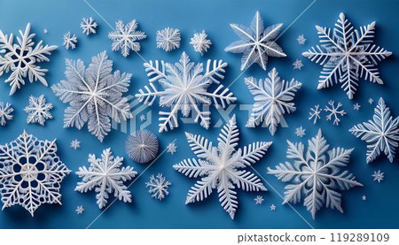 淺藍色背景上的白色雪花 119289109