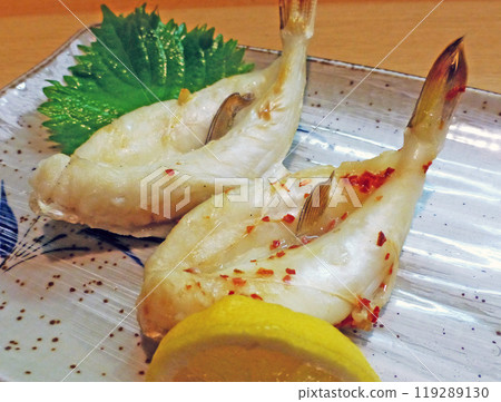 A photograph of overnight dried small pufferfish that is full of sweetness and umami and plump. A photograph of overnight dried small pufferfish that is full of sweetness and umami and plump. 119289130