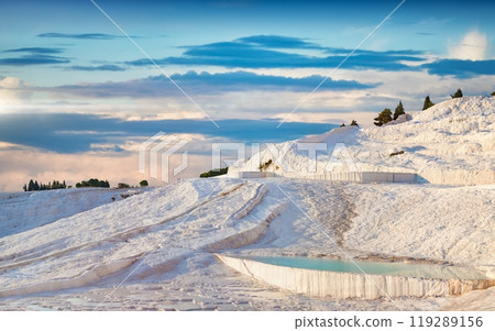 Travertine terrace formations left by flowing thermal springs in Pamukkale, literally "Cotton Castle" in Turkish, most visited attraction in Turkey 119289156