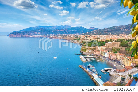 Aerial view of Marina Grande, cliff coastline Sorrento and Gulf of Naples, Italy. Bunches of lemons on foreground. Aerial view of Marina Grande, cliff coastline Sorrento and Gulf of Naples, Italy. Bunches of lemons on foreground. 119289167