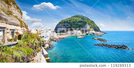 Beautiful coast of village Sant'Angelo, giant green rock in blue sea near Ischia Island, Italy. Beautiful coast of village Sant'Angelo, giant green rock in blue sea near Ischia Island, Italy. 119289313