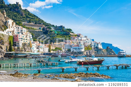 Beautiful seaside town Amalfi in province of Salerno, Campania, Italy. Amalfi coast is popular travel and holyday destination in Europe. Beautiful seaside town Amalfi in province of Salerno, Campania, Italy. Amalfi coast is popular travel and holyday destination in Europe. 119289331