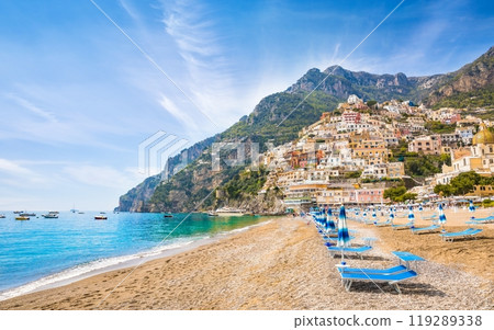 Beautiful Positano with colorful architecture on hills leading down to coast, comfortable beaches and azure sea on Amalfi Coast in Campania, Italy. Beautiful Positano with colorful architecture on hills leading down to coast, comfortable beaches and azure sea on Amalfi Coast in Campania, Italy. 119289338