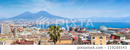 Panoramic view of Naples, Italy. Castel Nuovo and Galleria Umberto I towering over roofs of neighboring houses of Naples. Panoramic view of Naples, Italy. Castel Nuovo and Galleria Umberto I towering over roofs of neighboring houses of Naples. 119289343