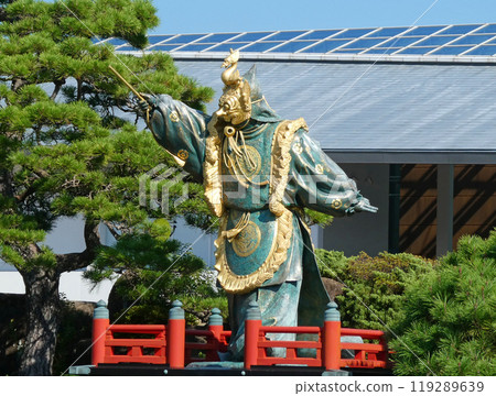 A photo of the Bugaku Lanling King Statue, a symbol of Miyajima in front of the ferry terminal at the island's entrance. 119289639