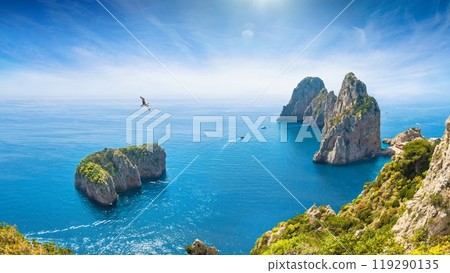 Famous Faraglioni Rocks near Capri Island, Italy. Beautiful paradise landscape with azure sea in summer sunny day. 119290135