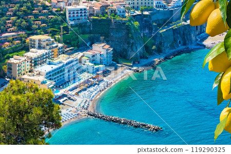Aerial view of cliff coastline Sorrento and Gulf of Naples, Italy. Clear azure sea and luxury hotels of Sorrento attract lot of tourists from all over world. 119290325