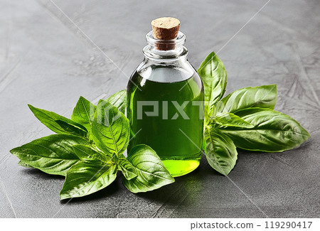 Basil syrup with leaves on white backgrounds 119290417