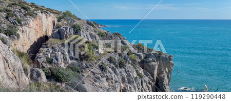 Rocky Mediterranean Coastline with Clear Blue Water 119290448