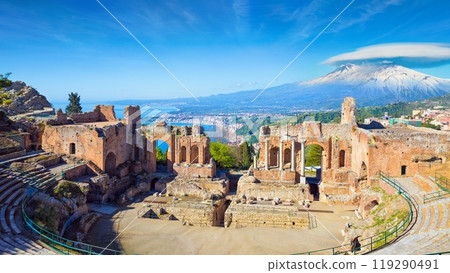 Morning view of ancient Greek theatre in Taormina on background of Etna Volcano, Sicily, Italy 119290491