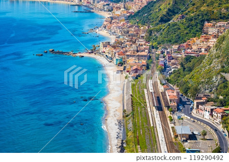 Aerial view of Taormina-Giardini station and Giardini Naxos, comune in Messina on Sicily Island, Italy. Aerial view of Taormina-Giardini station and Giardini Naxos, comune in Messina on Sicily Island, Italy. 119290492