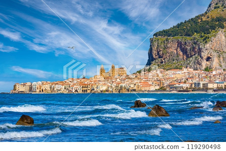 Blue sea near Cefalu, town in Italian Metropolitan City of Palermo located on Tyrrhenian coast of Sicily, Italy. 119290498