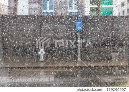 Water drops of rain on a window glass 119290997