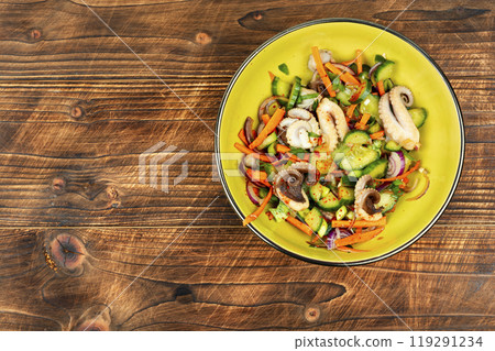 Spicy squid salad with mix vegetables. Spicy squid salad with mix vegetables. 119291234