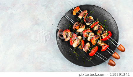 Octopus skewers grilled. 119291241