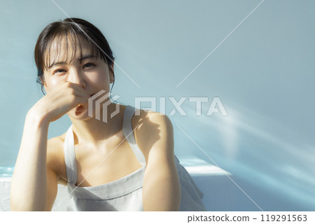 Woman taking care of her body Woman taking care of her body 119291563