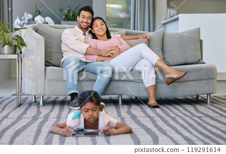 Relax, parents and child with tablet in living room watching movie, film or show online at home. Happy, love and mother and father bonding on sofa with girl streaming with digital technology on floor 119291614