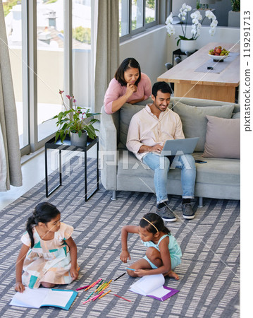 Children, relax and parents on laptop in lounge on holiday or vacation with streaming in home. Kids, drawing or sketch in living room with father reading info or watch video on computer with mother Children, relax and parents on laptop in lounge on holiday or vacation with streaming in home. Kids, drawing or sketch in living room with father reading info or watch video on computer with mother 119291713