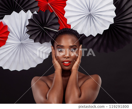 Female person, portrait and origami on hair in studio background for fashion with makeup, art and decor. African woman, artist and glamour for creativity, beauty or design with pride or confidence 119291800