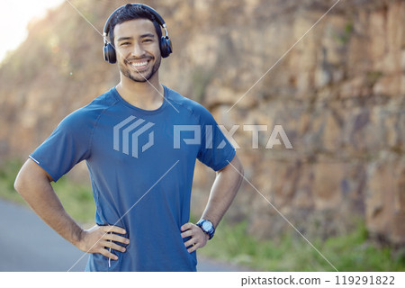 Portrait, fitness and happy man in headphones outdoor for exercise music, streaming radio or listen to audio podcast. Face, confidence and person in nature for sport, summer or body health in Mexico 119291822