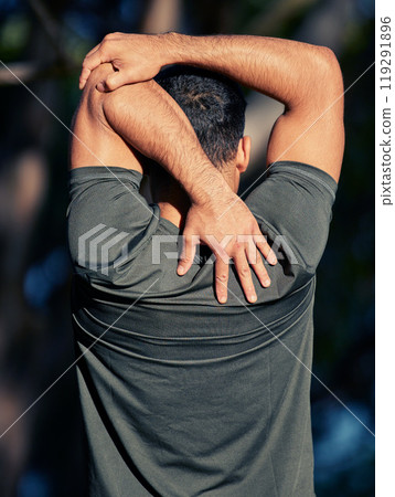 Fitness, arm and man stretching for warm up before workout or morning training routine for race or wellness. Person, back view and outdoor with exercise for marathon or health, cardio and sports. 119291896