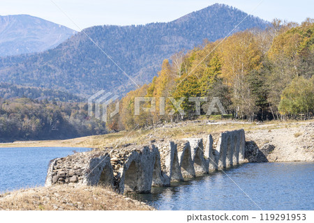 Taushubetsu River Bridge on the former Shihoro Line of the Japanese National Railways on a clear autumn day in Kamishihoro, Hokkaido 119291953
