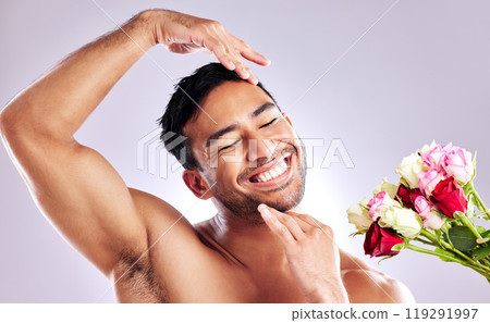 Smile, man and hygiene with flower in studio, beauty and skincare for fresh, clean and healthy body, plants and cosmetic in salon. Confident, person and spring, nature or glow for white background 119291997