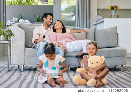 Relax, parents and kids on sofa with busy family, watching tv and bonding together in smart home. Mom, dad and girl children on carpet with smile, tablet and online movie subscription in living room. Relax, parents and kids on sofa with busy family, watching tv and bonding together in smart home. Mom, dad and girl children on carpet with smile, tablet and online movie subscription in living room. 119292008