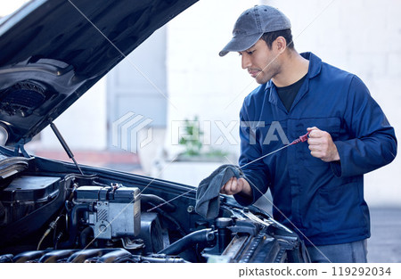 Man, inspection and engine with cloth for oil in motor, workshop or maintenance on car. Male mechanic, auto and check for problem or service in garage, technician with knowledge on transport Man, inspection and engine with cloth for oil in motor, workshop or maintenance on car. Male mechanic, auto and check for problem or service in garage, technician with knowledge on transport 119292034