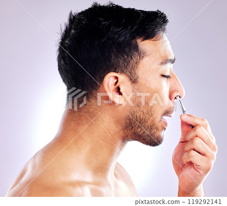 Man, tweezer and nose for plucking of hair, studio and routine in morning, aesthetic and hand. Grooming, self care and steel tools for hygiene, model and person in white background and profile Man, tweezer and nose for plucking of hair, studio and routine in morning, aesthetic and hand. Grooming, self care and steel tools for hygiene, model and person in white background and profile 119292141
