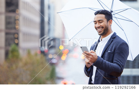 Businessman, phone and umbrella with communication in city for justice, advocate for legal with tech. Male lawyer, rain or parasol for safety in urban with mobile, attorney in New York for court Businessman, phone and umbrella with communication in city for justice, advocate for legal with tech. Male lawyer, rain or parasol for safety in urban with mobile, attorney in New York for court 119292166