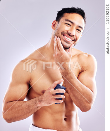 Man, smile and aftershave for face, beard and grooming for beauty and aesthetic wellness for healthy skin on studio background. Happy, guy and model for facial hair or dermatology, body and cosmetics 119292198