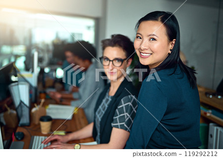Women, web designer and smile in portrait as employees in workplace for development, collaboration and teamwork. Female people, workers and creative for design, company or startup in office for job Women, web designer and smile in portrait as employees in workplace for development, collaboration and teamwork. Female people, workers and creative for design, company or startup in office for job 119292212