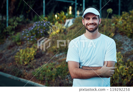 It takes lots of training to become the best. Portrait of a sporty young man standing on a tennis court. It takes lots of training to become the best. Portrait of a sporty young man standing on a tennis court. 119292258