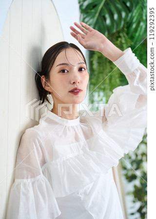 woman leaning against the wall woman leaning against the wall 119292395