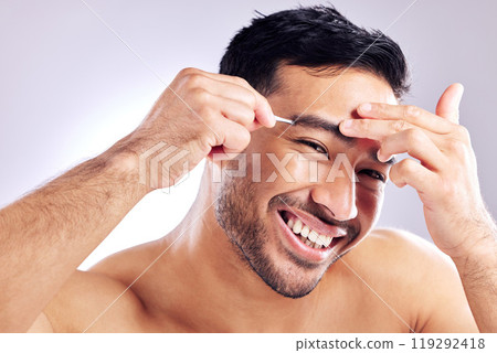 Grooming, portrait and man with tweezer for eyebrow, studio and routine in morning, aesthetic and hand. Transformation, white background and tools for maintenance of shape with hair removal of person Grooming, portrait and man with tweezer for eyebrow, studio and routine in morning, aesthetic and hand. Transformation, white background and tools for maintenance of shape with hair removal of person 119292418