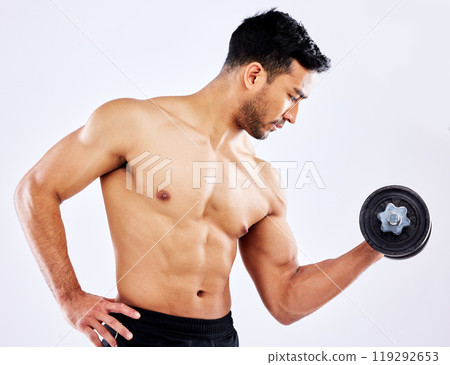 Muscular man, fitness and weightlifting with dumbbell for workout, strength or muscle gain on a gray studio background. Profile of young male person or active bodybuilder with bicep curl for exercise Muscular man, fitness and weightlifting with dumbbell for workout, strength or muscle gain on a gray studio background. Profile of young male person or active bodybuilder with bicep curl for exercise 119292653