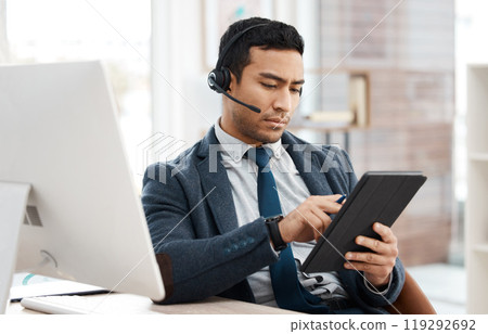 Man, agent and call centre or working with tablet, crm and telemarketing with sales consultant. Support, help desk and employee with headset for online communication job, searching faq on internet 119292692