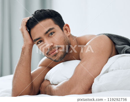 Morning, portrait and Asian man lying in bed with confidence for relax, wellness and wakeup in bedroom. Home, body and male person with muscles for resting, comfortable or weekend break in apartment Morning, portrait and Asian man lying in bed with confidence for relax, wellness and wakeup in bedroom. Home, body and male person with muscles for resting, comfortable or weekend break in apartment 119292736