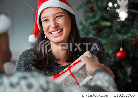 Excited, couple and giving a present on Christmas in home with love on vacation or holiday, Happy, woman and gratitude for gift package or box with ribbon at event and giveaway celebration of Xmas Excited, couple and giving a present on Christmas in home with love on vacation or holiday, Happy, woman and gratitude for gift package or box with ribbon at event and giveaway celebration of Xmas 119292760