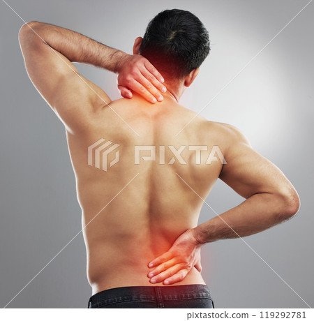Back, man and body pain in studio after fitness, backache or shoulder strain as medical crisis. Muscle injury, male model or red glow with inflammation, sport accident or tension by gray background 119292781