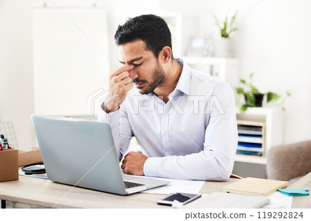 Business man, headache and laptop in office with stock market crash and financial problem. Stress, anxiety and burnout of a banker and professional with accounting risk and audit report or debt 119292824