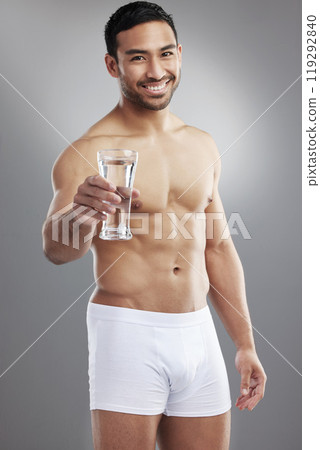 Asian man, portrait and water glass or healthy hydration or care for weight loss goals, wellness or exercise. Male person, face and grey background for gym fitness in studio, shirtless or bodybuilder Asian man, portrait and water glass or healthy hydration or care for weight loss goals, wellness or exercise. Male person, face and grey background for gym fitness in studio, shirtless or bodybuilder 119292840