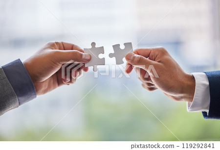 Hands, collaboration and business people with puzzle in office for partnership or synergy with joint effort. Crm, corporate and teamwork with unity in company or trust with employees in Switzerland. Hands, collaboration and business people with puzzle in office for partnership or synergy with joint effort. Crm, corporate and teamwork with unity in company or trust with employees in Switzerland. 119292841