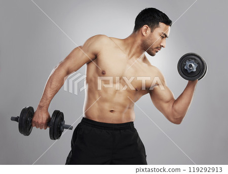Asian man, dumbbell and weightlifting or strong training on studio grey background, biceps or athlete. Male person, bodybuilder and muscle exercise or workout confidence for sports, warm up or gym Asian man, dumbbell and weightlifting or strong training on studio grey background, biceps or athlete. Male person, bodybuilder and muscle exercise or workout confidence for sports, warm up or gym 119292913